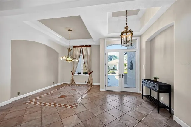 a kitchen with stainless steel appliances granite countertop a sink stove and microwave