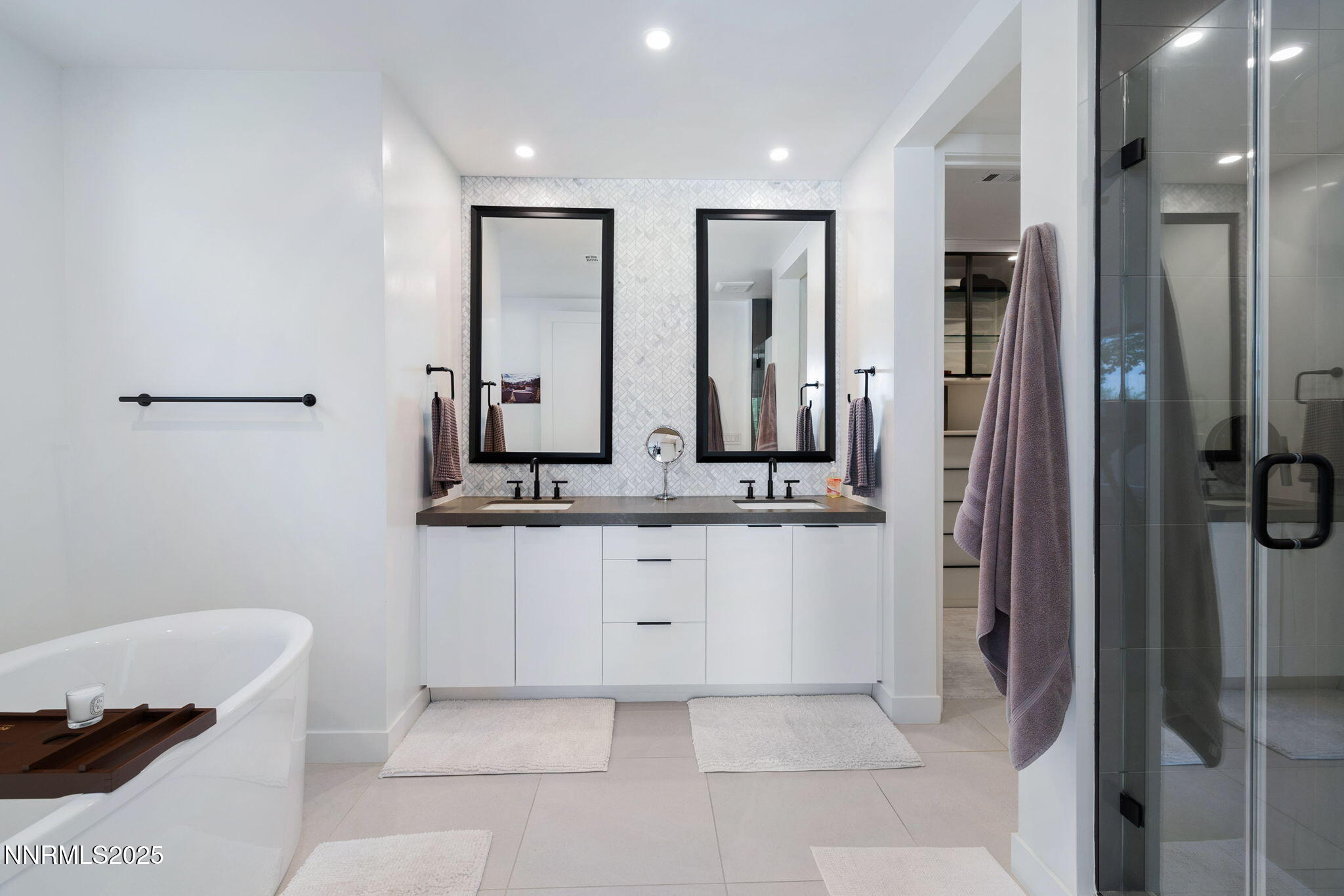 16 Persano Street Reno, NV 89511 - Photo 17 of 44 a bathroom with a double vanity sink mirror and toilet