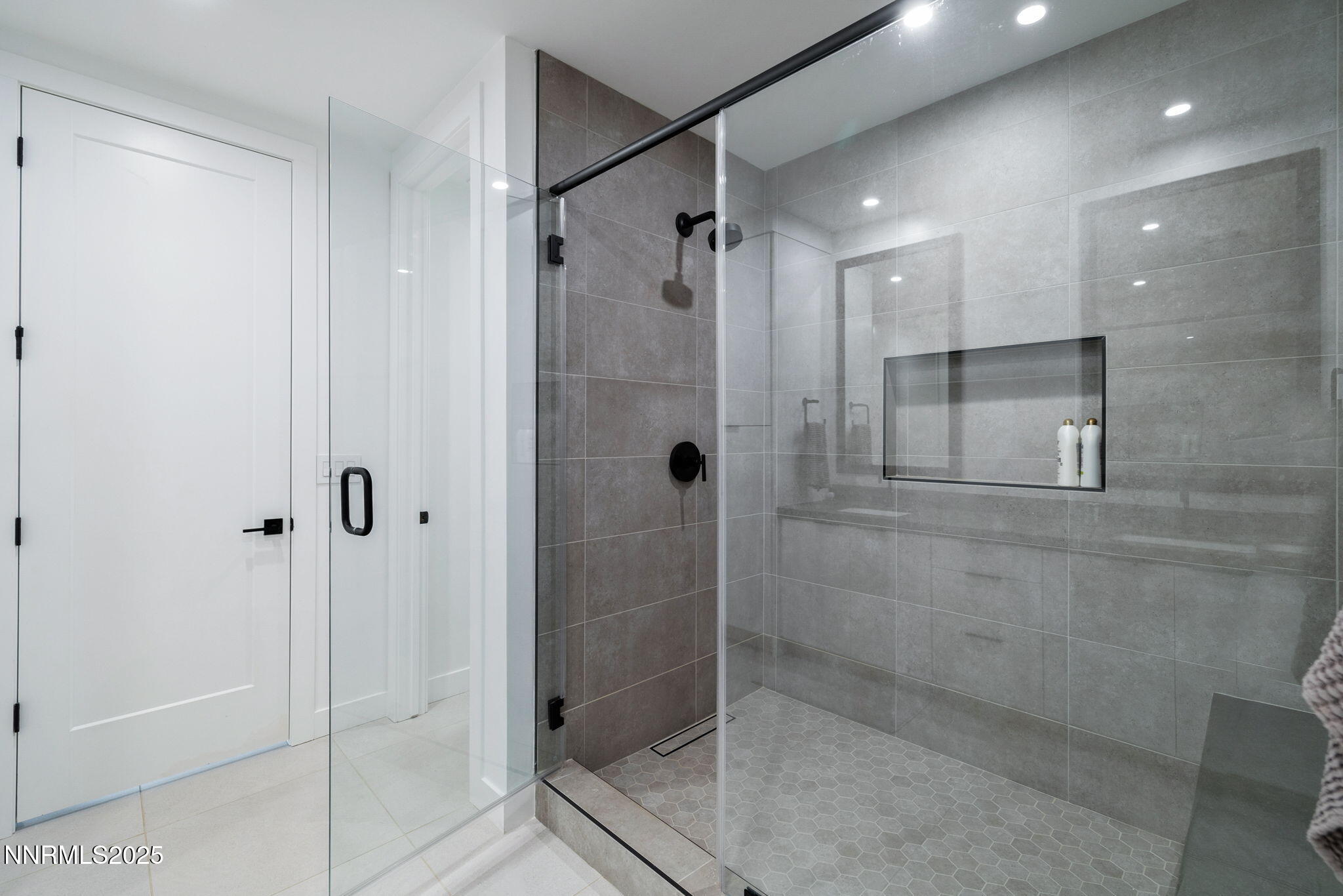 16 Persano Street Reno, NV 89511 - Photo 23 of 44 a bathroom with a shower and a sink