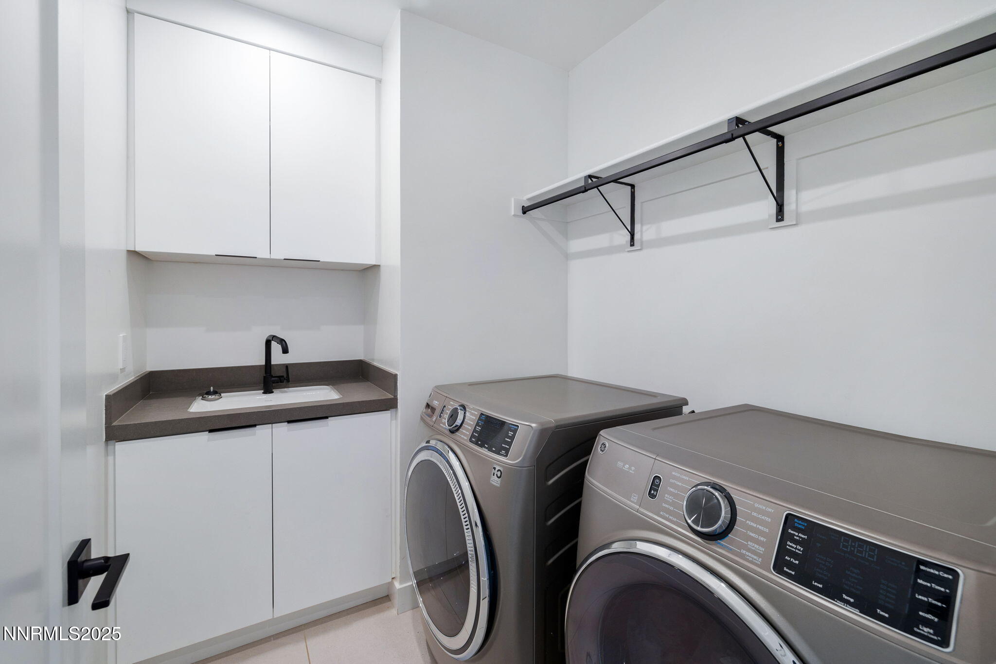 16 Persano Street Reno, NV 89511 - Photo 24 of 44 a utility room with dryer and washer