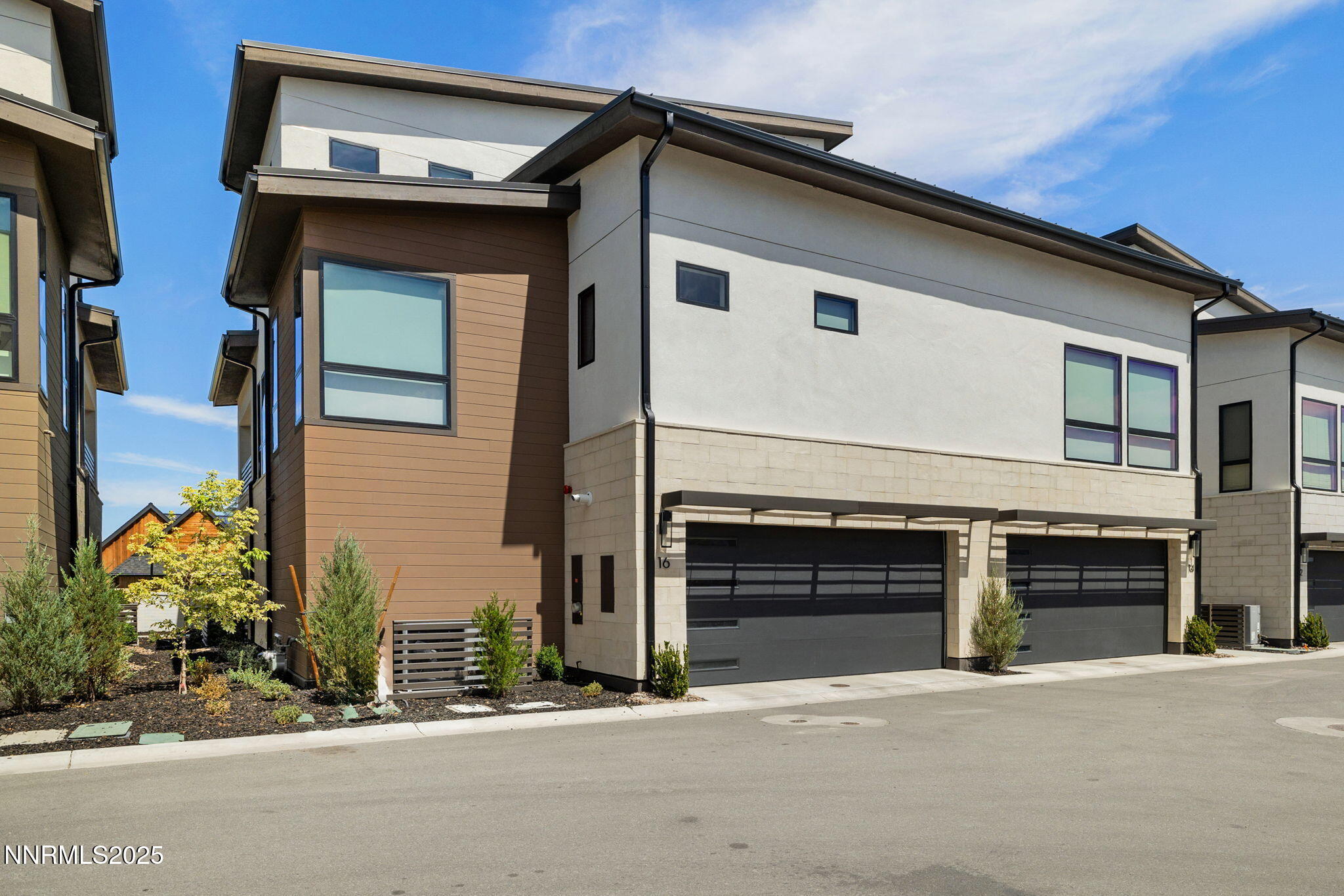16 Persano Street Reno, NV 89511 - Photo 32 of 44 a front view of a house with a garage