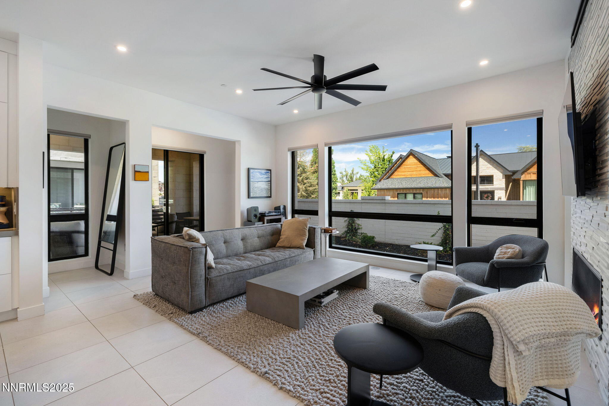 16 Persano Street Reno, NV 89511 - Photo 7 of 44 a living room with furniture and a large window
