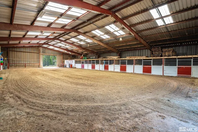 a view of an empty room with a garage