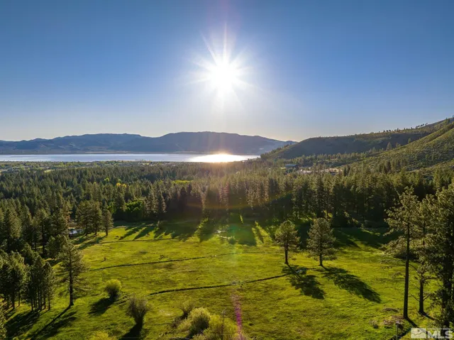 a view of a swimming pool with a mountain