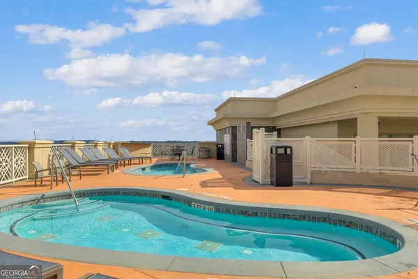 a view of swimming pool with ocean view