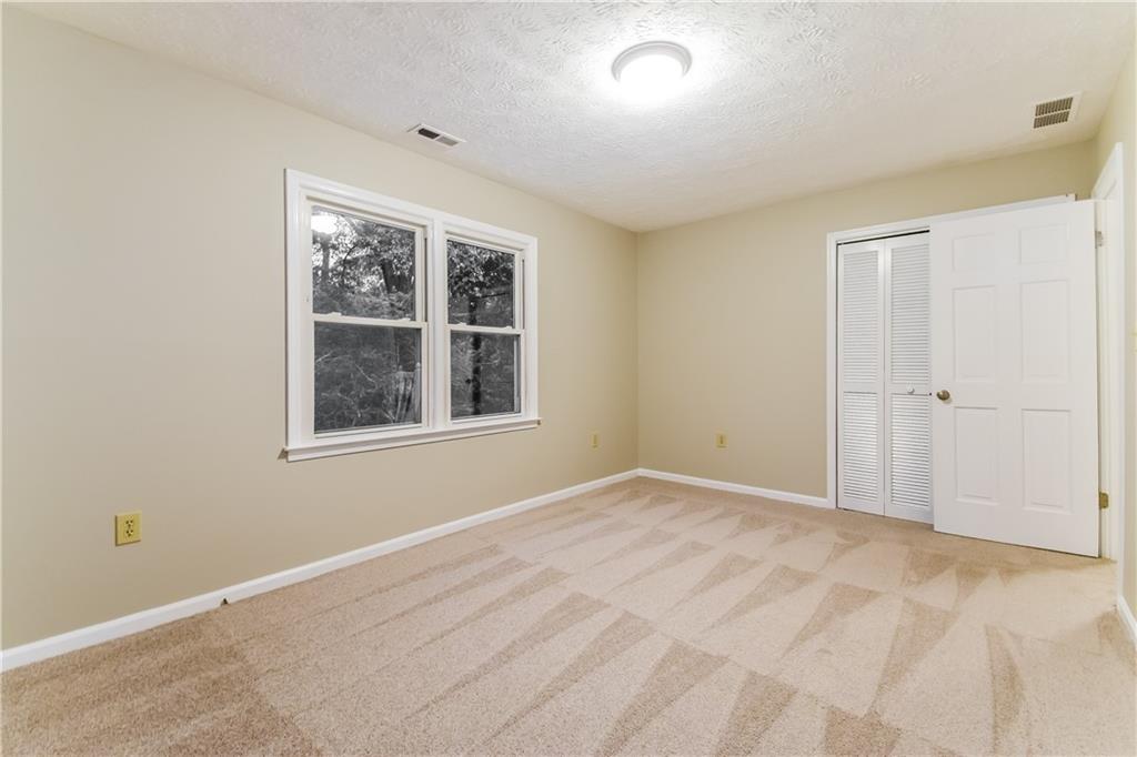 3119 Windfield Circle Tucker, GA 30084 - Photo 15 of 20 an empty room with a window