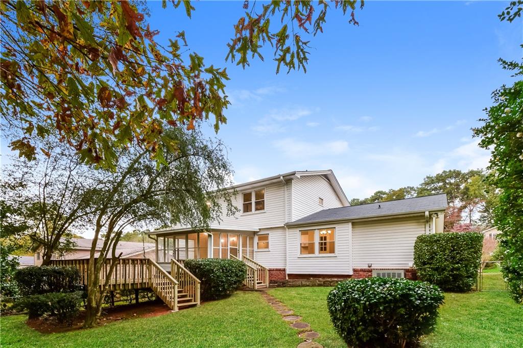 3119 Windfield Circle Tucker, GA 30084 - Photo 18 of 20 a front view of a house with a garden