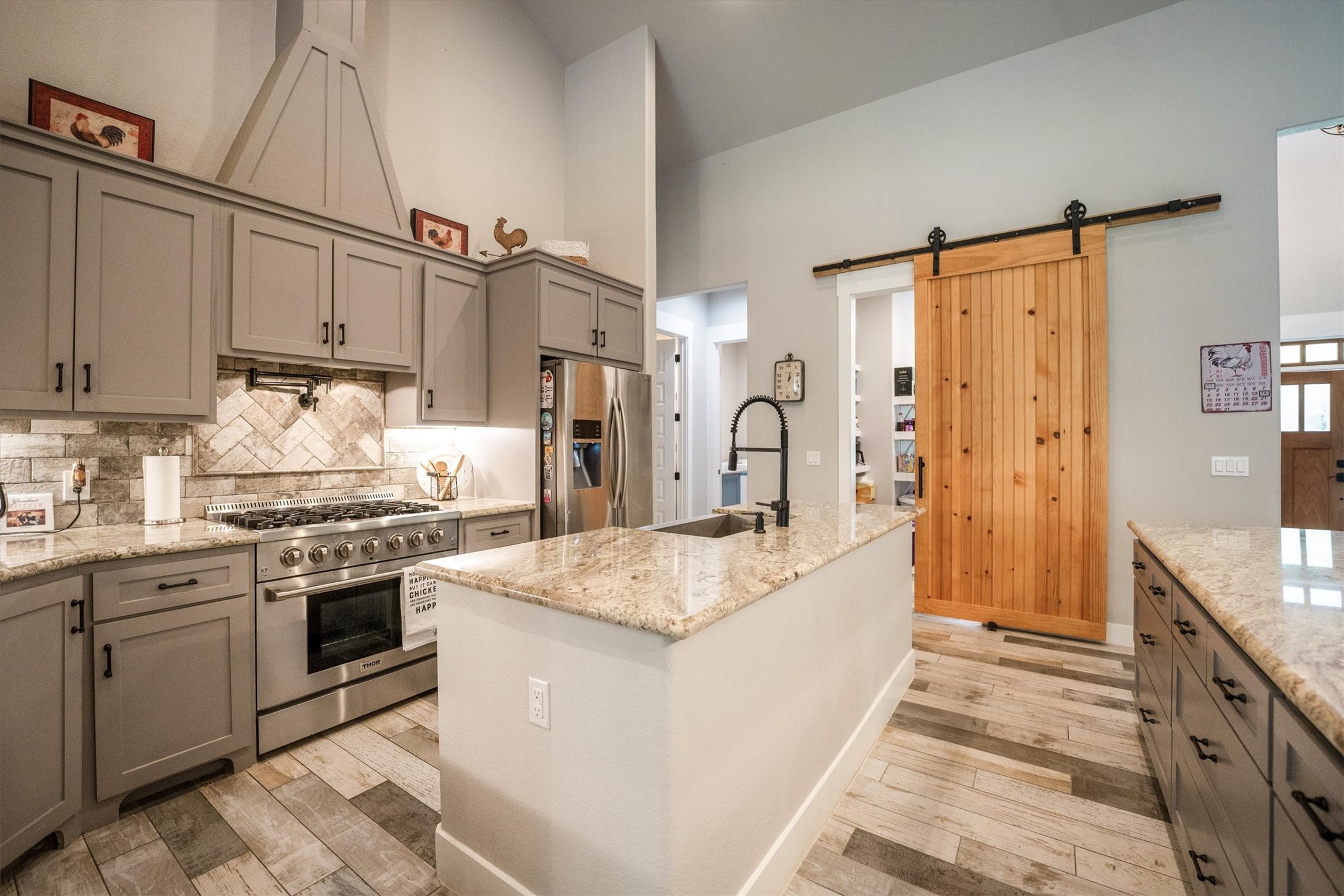 1022 Fm 1696 Road West Huntsville, TX 77320 - Photo 13 of 50 An additional island with built in sink and dishwasher