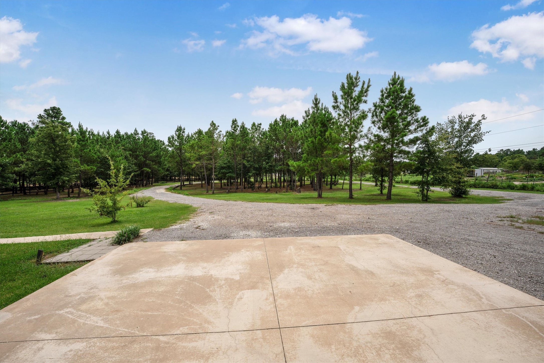 1022 Fm 1696 Road West Huntsville, TX 77320 - Photo 35 of 50 Paved parking spaces in front of the garage