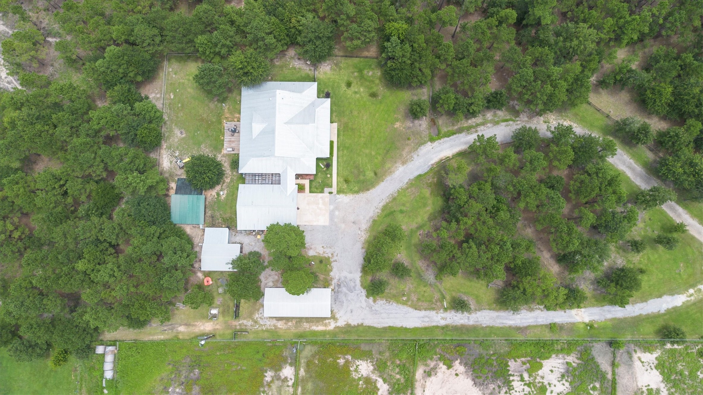 1022 Fm 1696 Road West Huntsville, TX 77320 - Photo 36 of 50 Aerial view of the property - country living with amenities not far away!