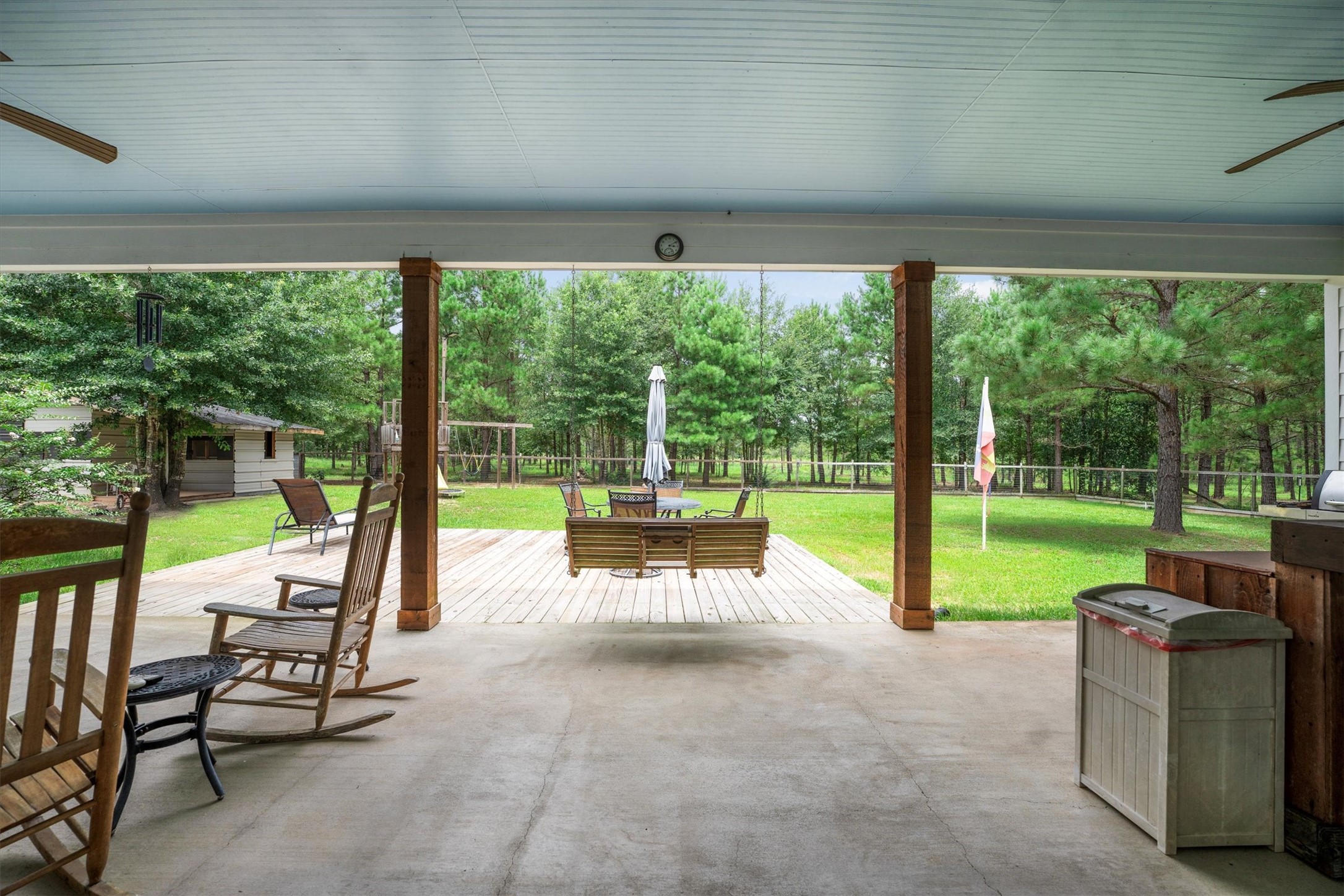 1022 Fm 1696 Road West Huntsville, TX 77320 - Photo 39 of 50 Backyard with covered porch perfect for entertaining