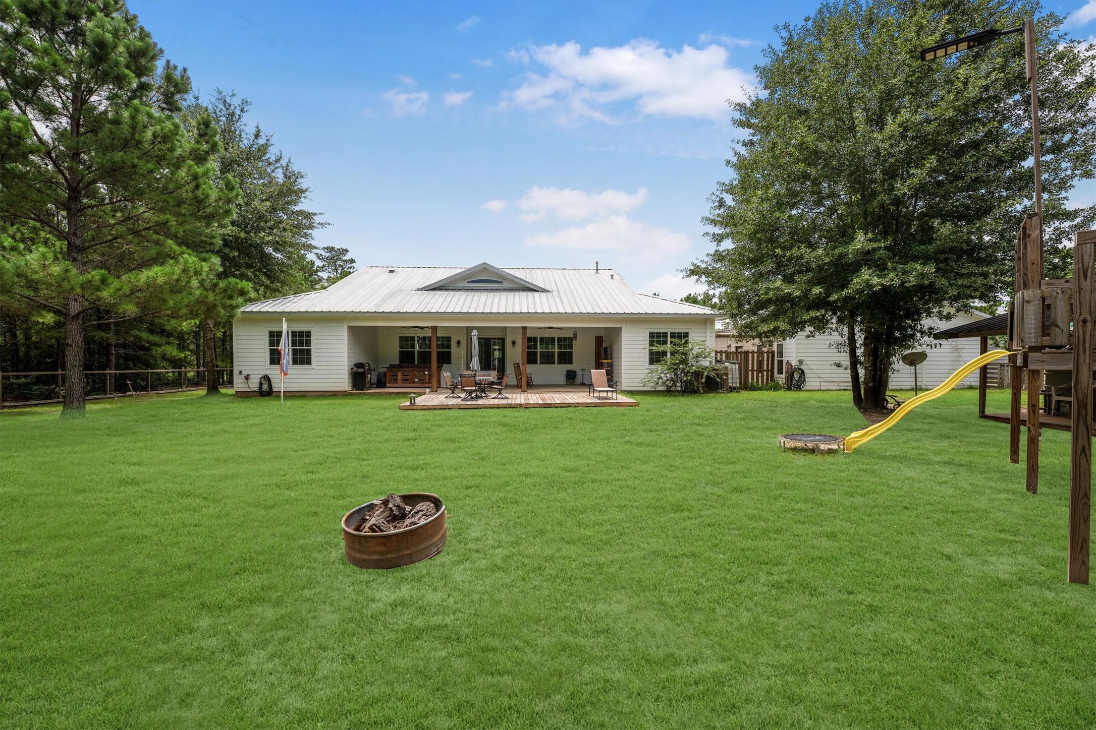 1022 Fm 1696 Road West Huntsville, TX 77320 - Photo 43 of 50 Enjoy the great outdoors with a cozy firepit