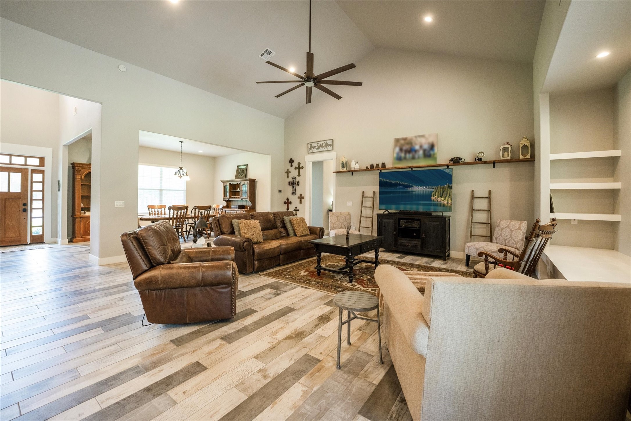 1022 Fm 1696 Road West Huntsville, TX 77320 - Photo 8 of 50 The living area has soaring 17' ceilings and connects seamlessly to the entry way, dining room and kitchen