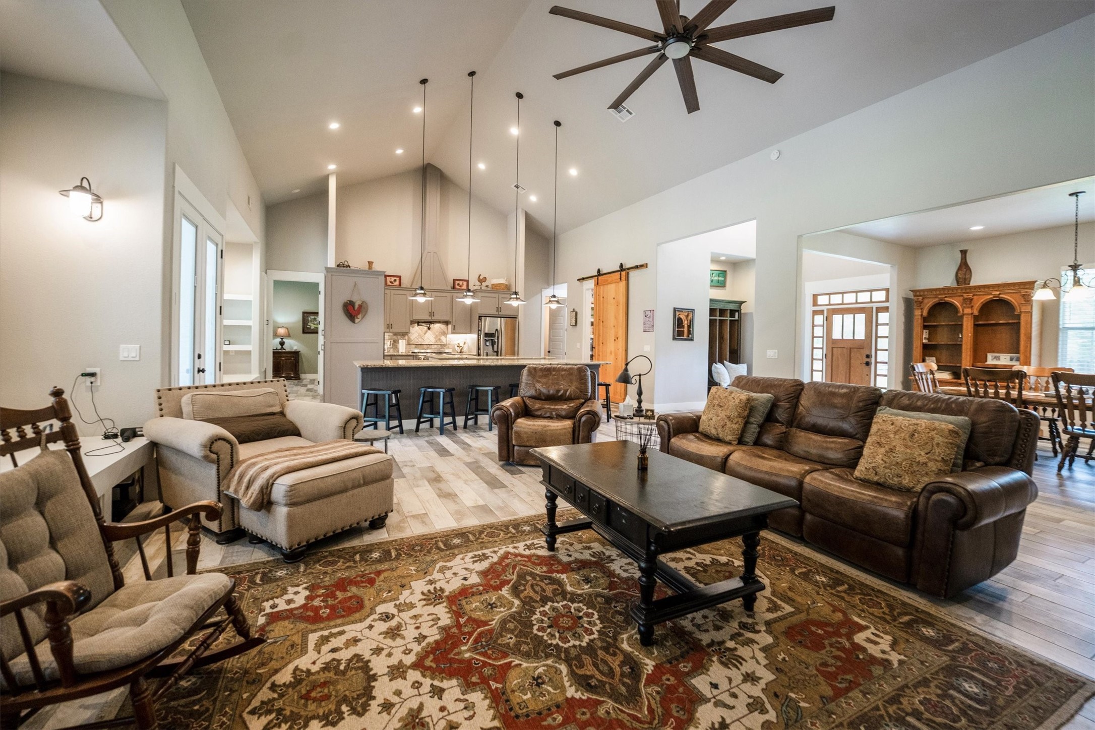 1022 Fm 1696 Road West Huntsville, TX 77320 - Photo 9 of 50 The vaulted ceiling makes the room feel open and spacious with a large ceiling fan adding to the comfort