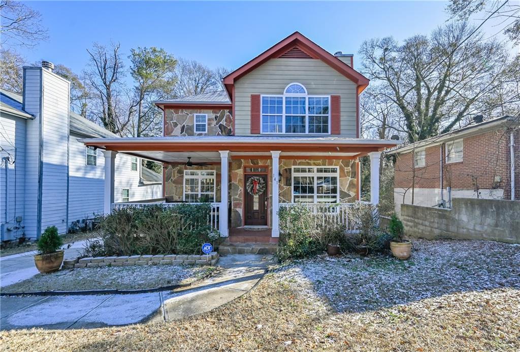 141 Hemphill School Road Northwest Atlanta, GA 30331 - Photo 1 of 1 a front view of a house with garden
