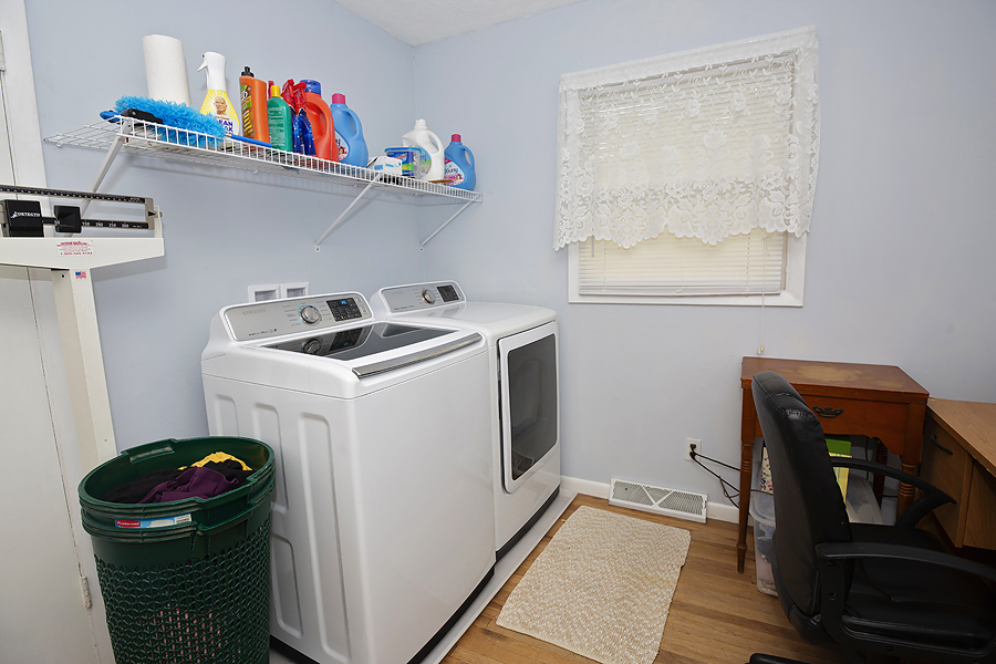 1313 Rutledge Road Bloomington, IL 61704 - Photo 11 of 29 a utility room with sink dryer and washer