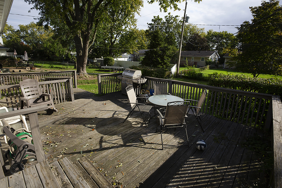 1313 Rutledge Road Bloomington, IL 61704 - Photo 24 of 29 a view of a table and chairs on the roof deck