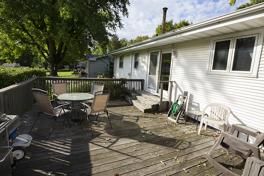 1313 Rutledge Road Bloomington, IL 61704 - Photo 28 of 29 a view of backyard with outdoor seating and trees