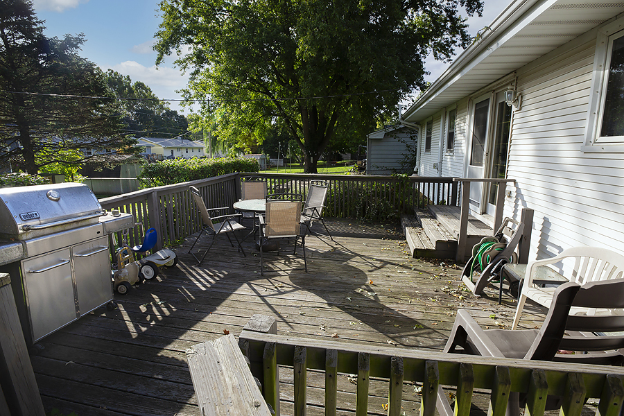 1313 Rutledge Road Bloomington, IL 61704 - Photo 29 of 29 a view of a patio with couches chairs and wooden floor