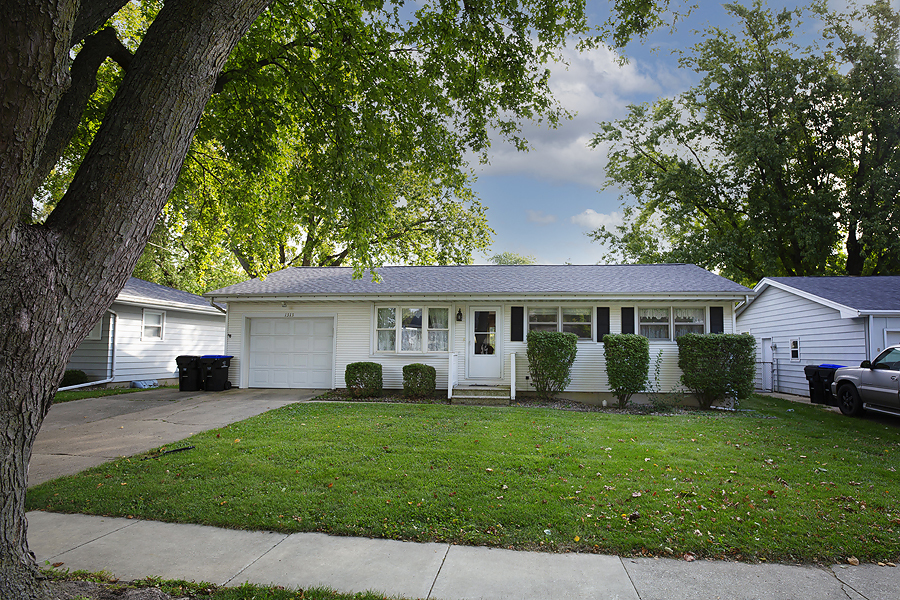 1313 Rutledge Road Bloomington, IL 61704 - Photo 3 of 29 a view of a house with a yard and tree s