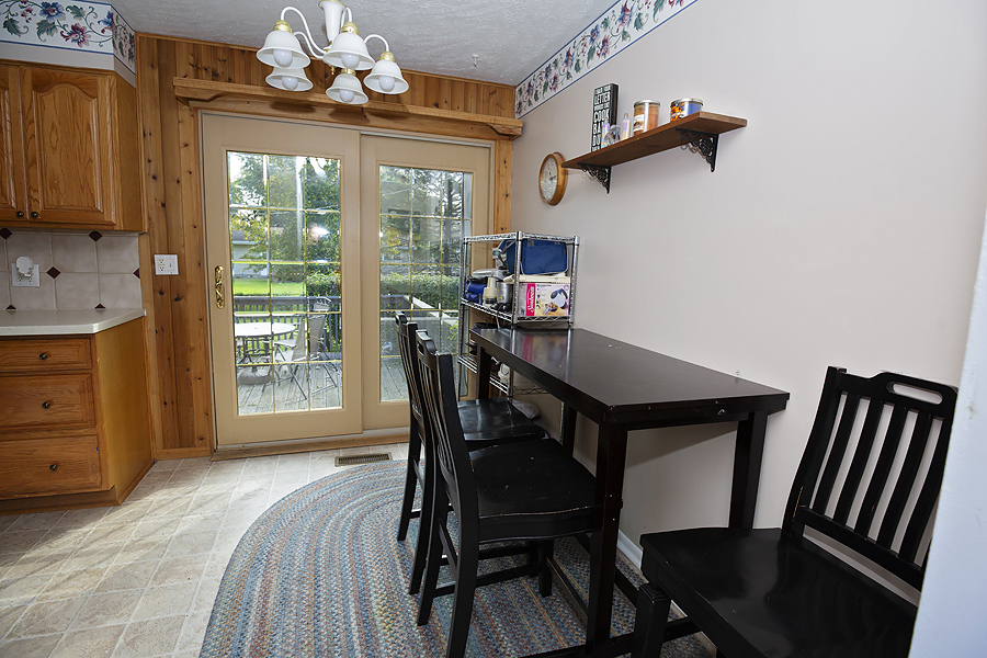 1313 Rutledge Road Bloomington, IL 61704 - Photo 7 of 29 a view of a dining room with furniture window and outside view