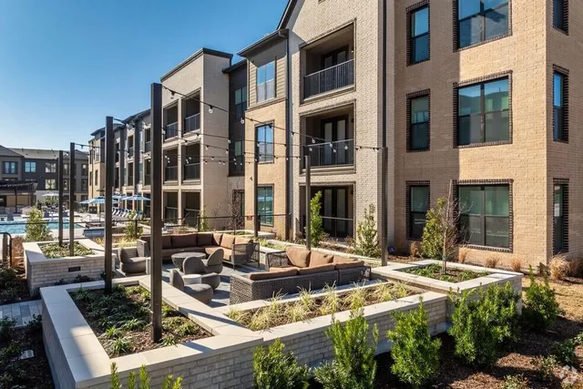 a view of a building with a patio