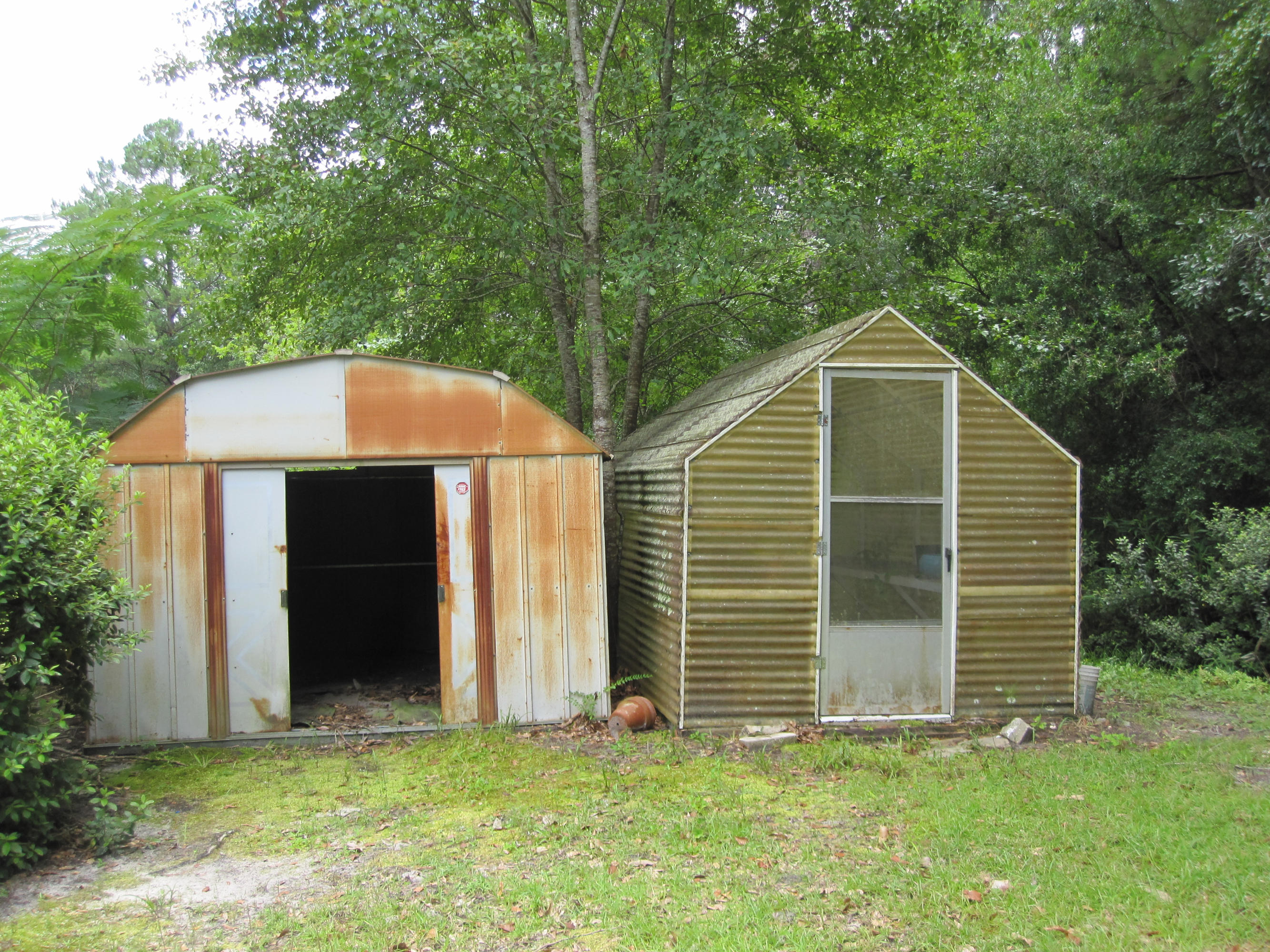 5260 Old River Road Baker, FL 32531 - Photo 29 of 30 a view of a house with a yard