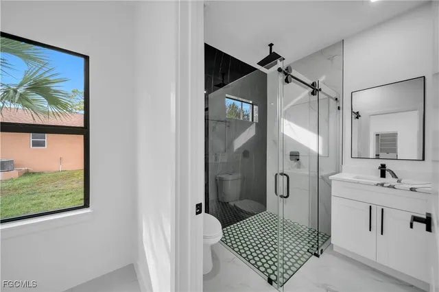 $310,000 | 907 East 9th Street, Lehigh Acres, FL 33972