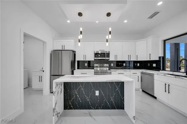 $310,000 | 907 East 9th Street, Lehigh Acres, FL 33972