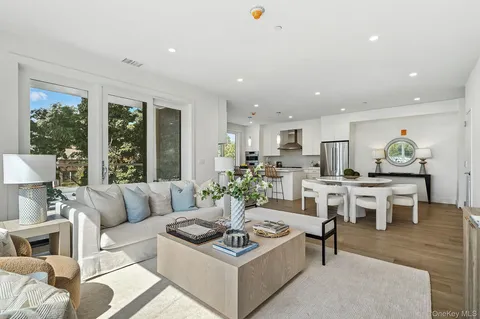 a living room with furniture and a table
