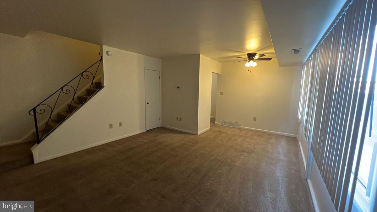 926 Taney Avenue, Unit 926 Frederick, MD 21702 - Photo 2 of 8 a view of a hallway with a door