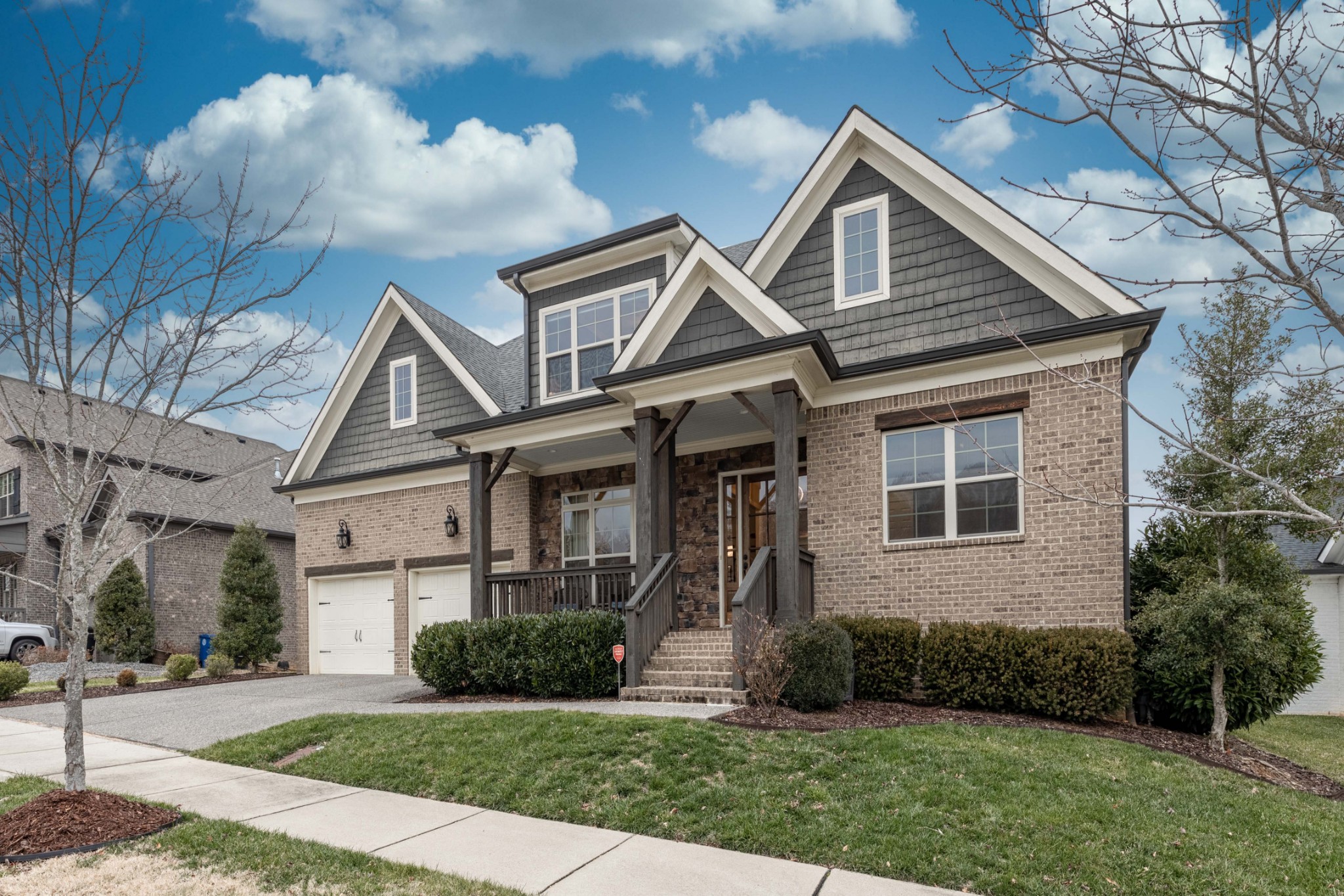 148 Truman Road West Franklin, TN 37064 - Photo 2 of 41 a front view of a house with a yard