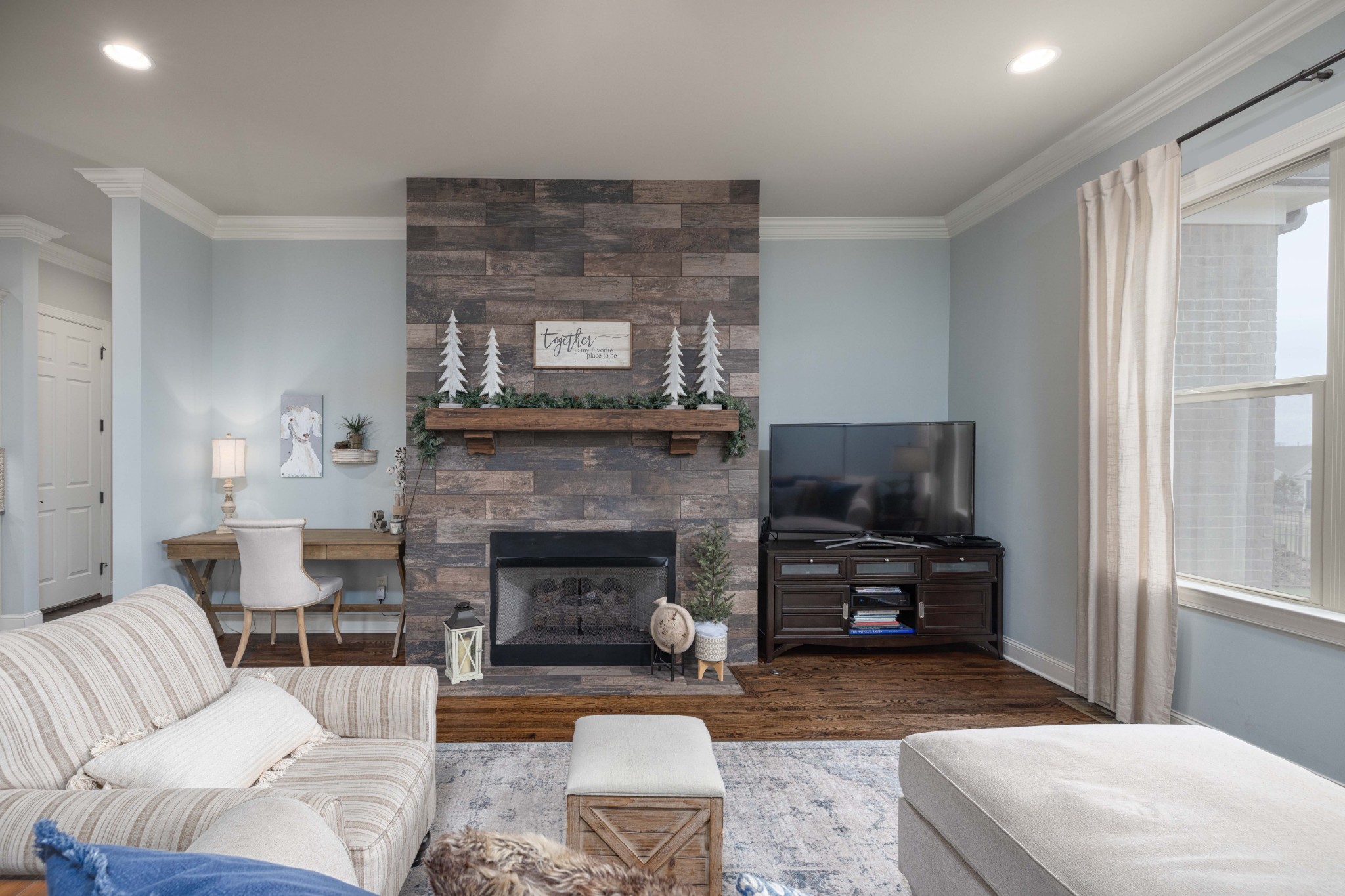 148 Truman Road West Franklin, TN 37064 - Photo 17 of 41 a living room with furniture and a fireplace