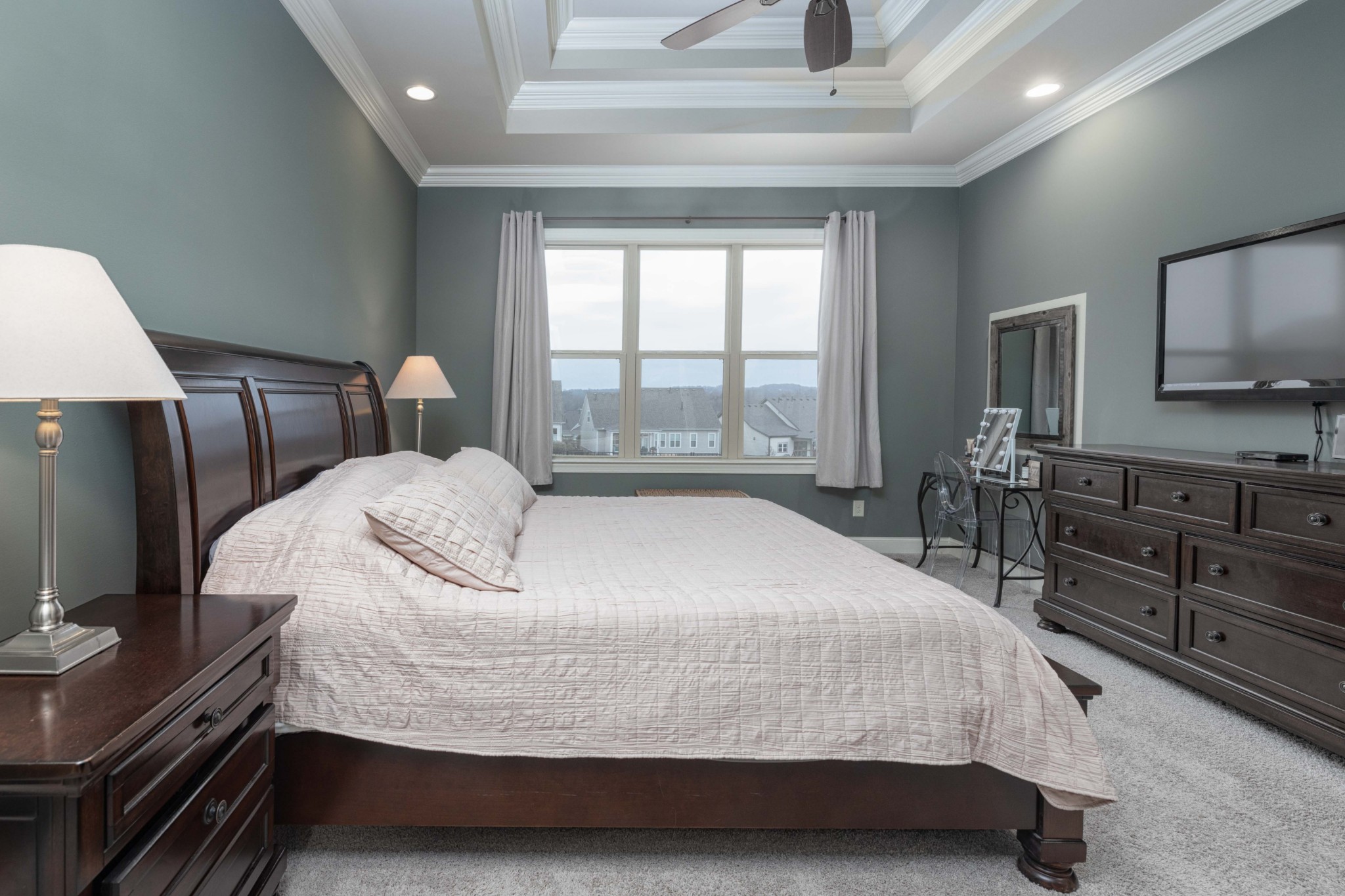 148 Truman Road West Franklin, TN 37064 - Photo 19 of 41 a bedroom with a large bed and a flat tv screen on dresser