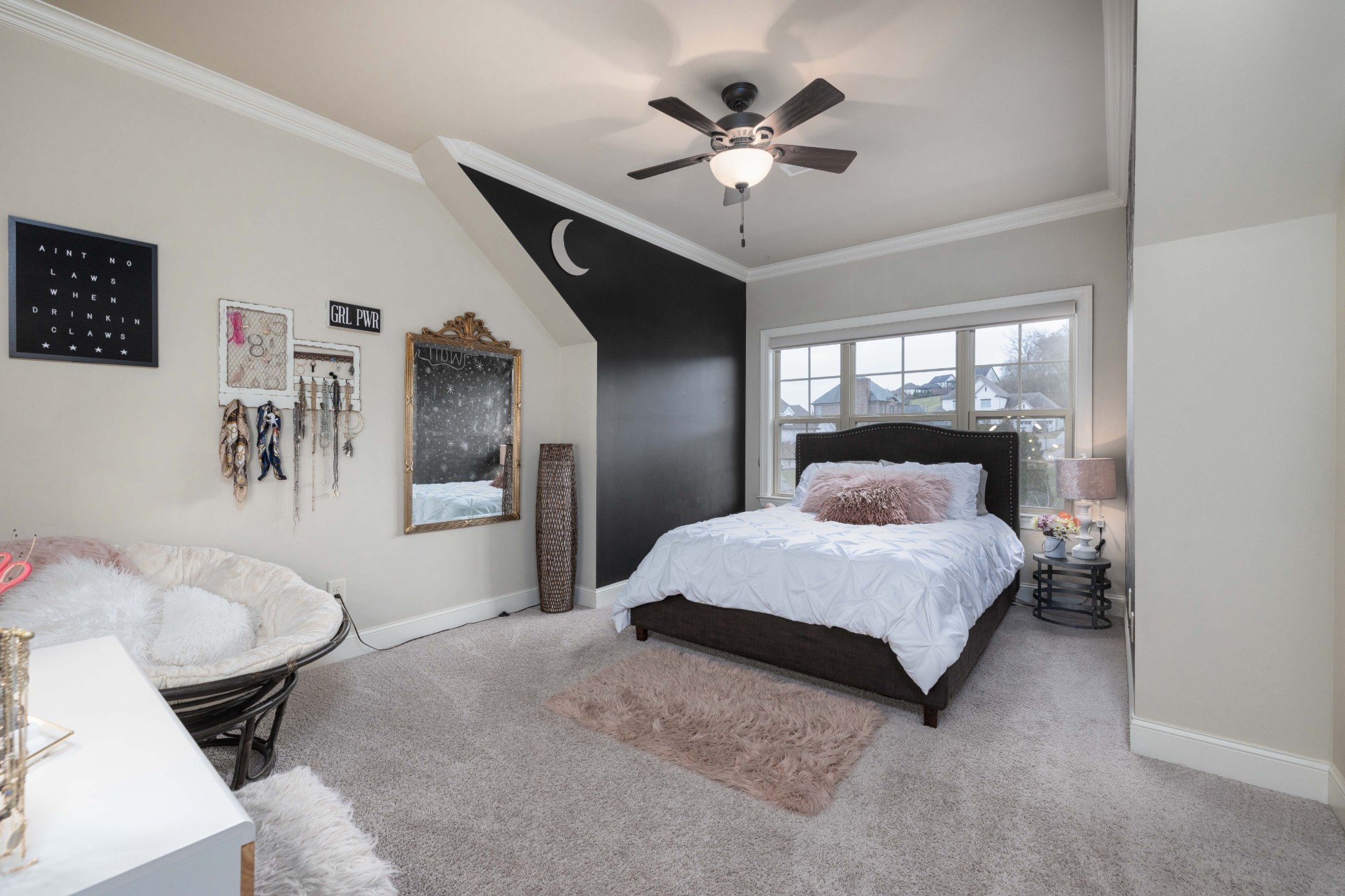 148 Truman Road West Franklin, TN 37064 - Photo 30 of 41 a bedroom with a bed and a chandelier