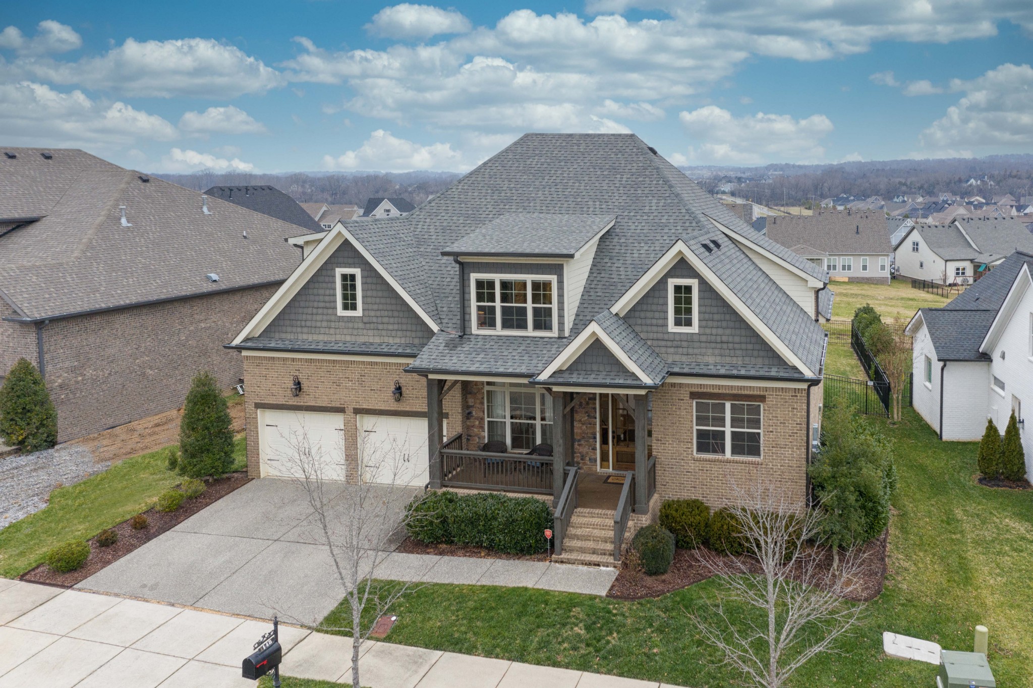 148 Truman Road West Franklin, TN 37064 - Photo 4 of 41 a front view of a house with garden