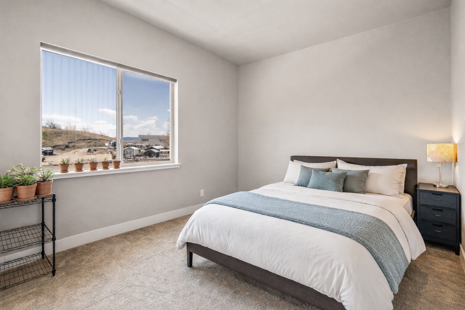 1680 Copper Ridge Drive, Unit 101 Steamboat Springs, CO 80487 - Photo 15 of 21 a bedroom with a bed and a window