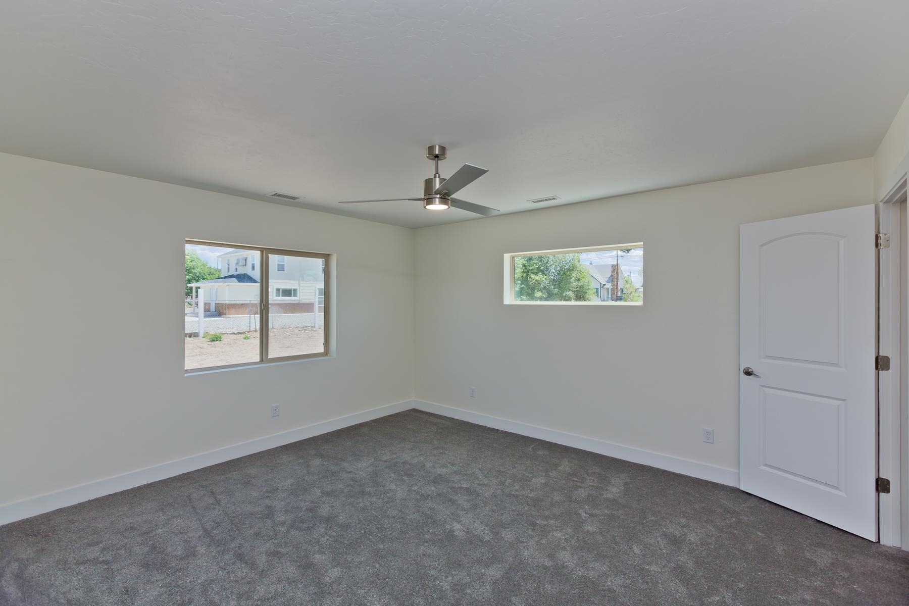 660 Nuvue Street Delta, CO 81416 - Photo 13 of 35 an empty room with a window