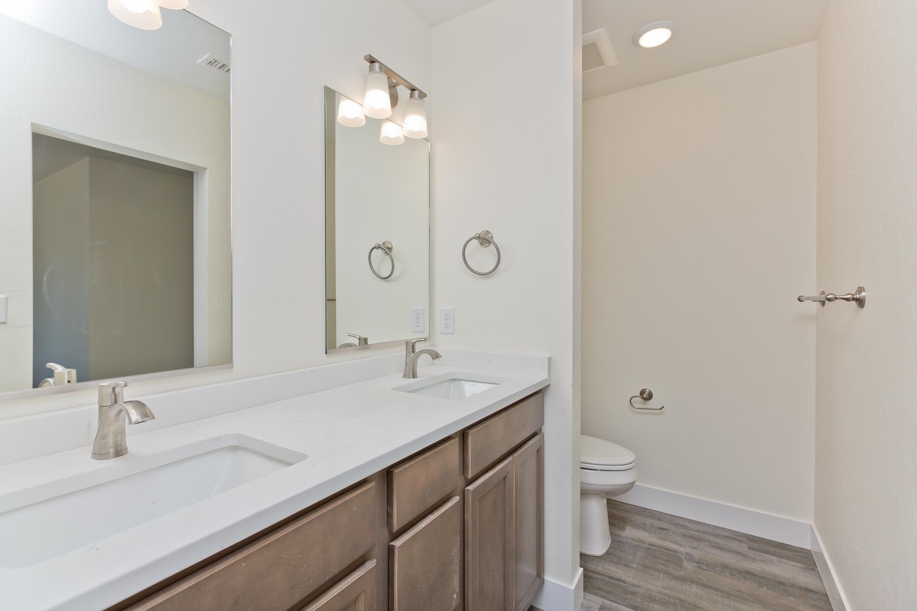 660 Nuvue Street Delta, CO 81416 - Photo 19 of 35 a bathroom with a sink a toilet and shower