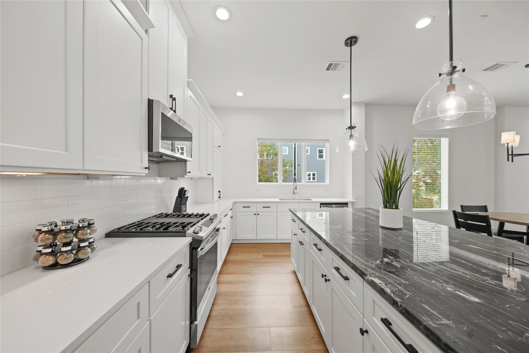 2510 Gray Street Houston, TX 77003 - Photo 14 of 15 a kitchen with sink stove and cabinets