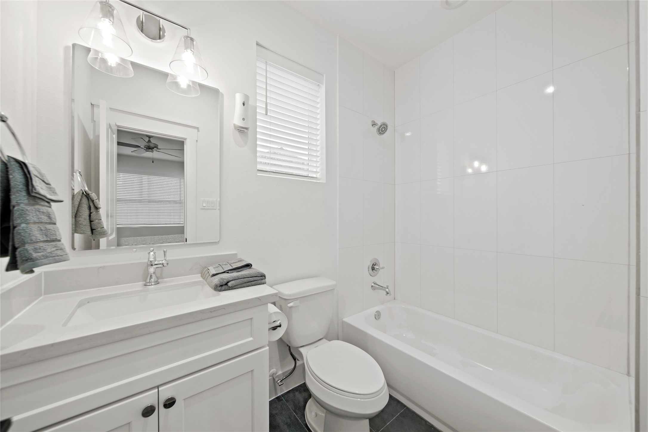 2510 Gray Street Houston, TX 77003 - Photo 4 of 15 a bathroom with a sink a toilet and shower