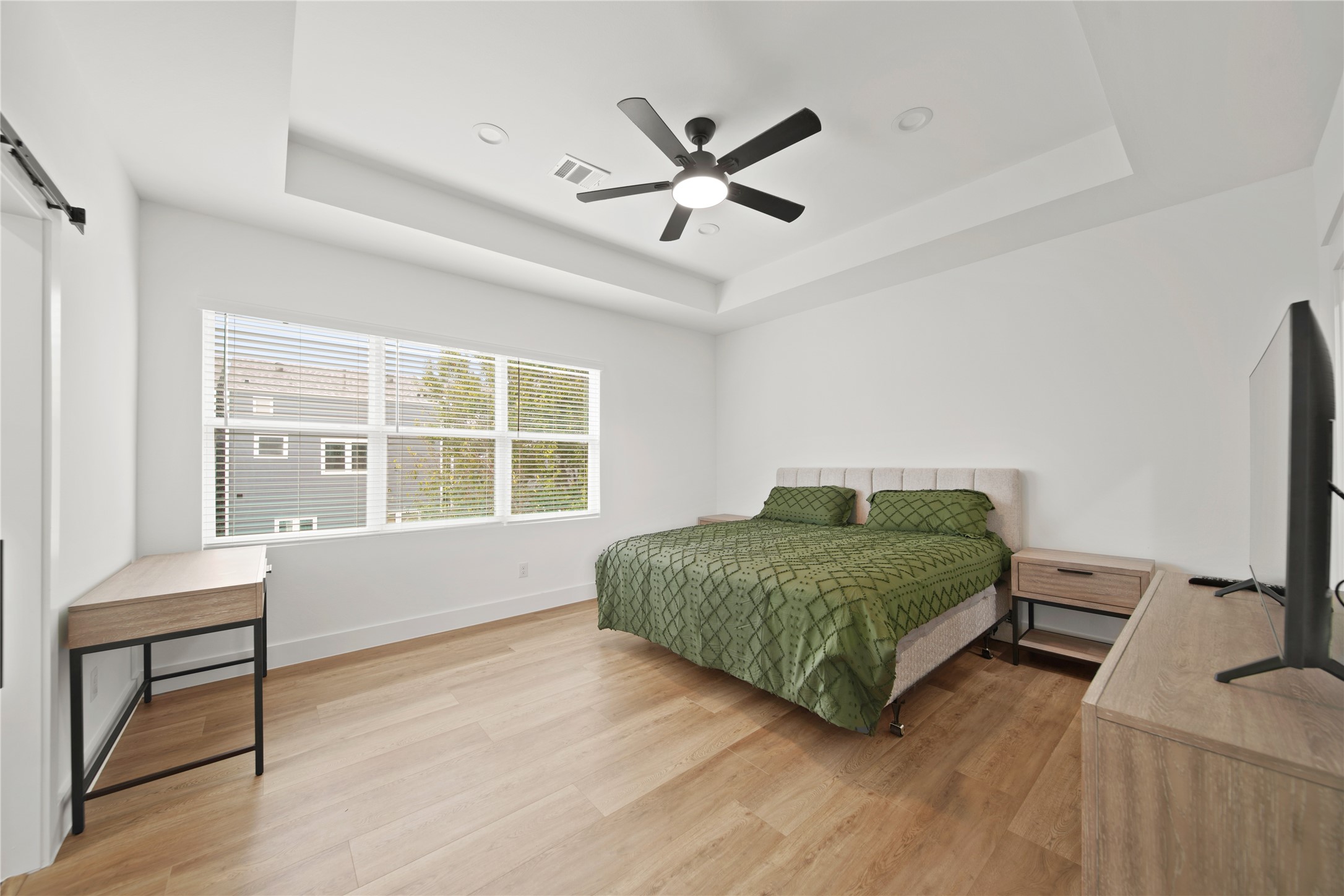 2510 Gray Street Houston, TX 77003 - Photo 6 of 15 a living room with a bed furniture and a window