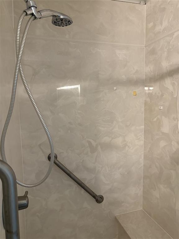 820 East South Street Welsh, LA 70591 - Photo 23 of 38 Main bath has a smaller shower and this handicap shower with seating