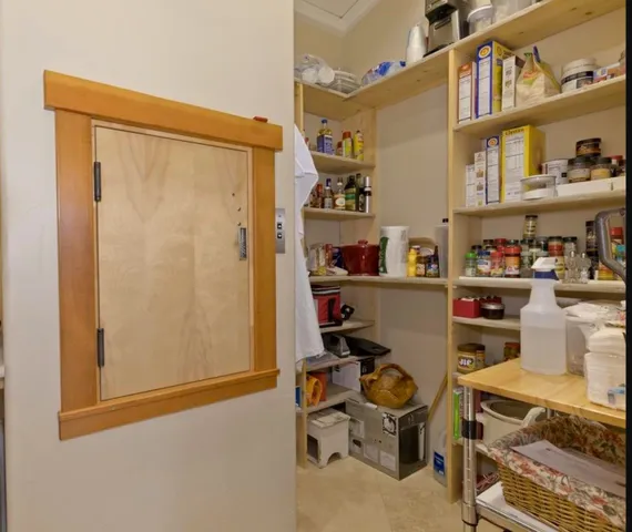 a view of a workspace with furniture