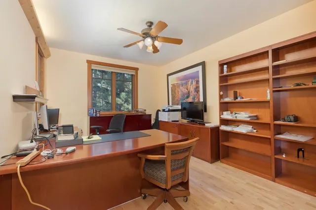 a view of a workspace with furniture