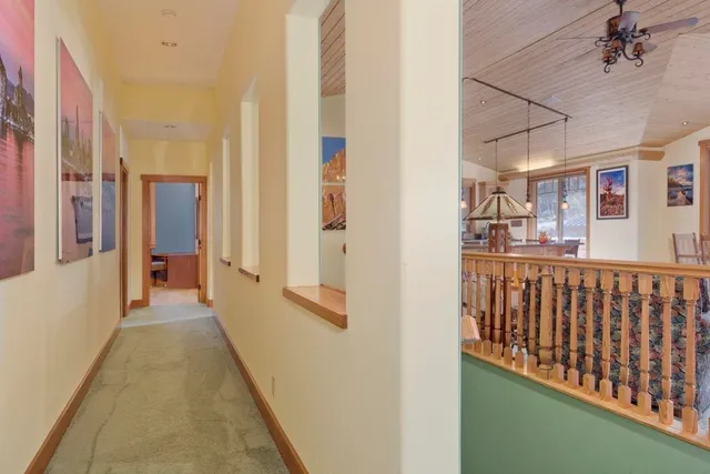 a view of a hallway with a white walls