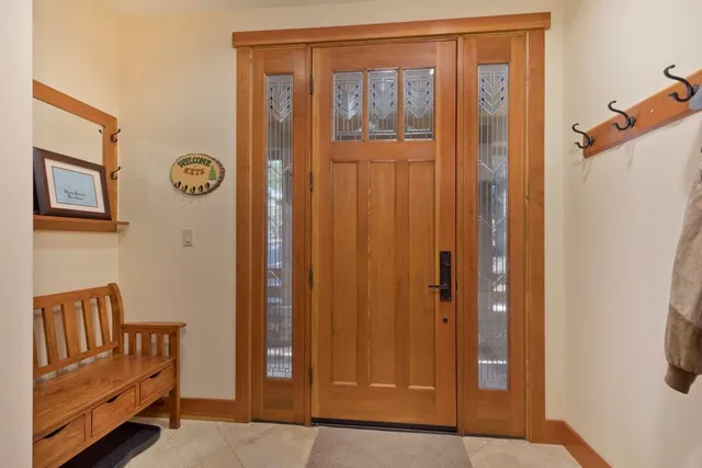 a view of front door with stairs