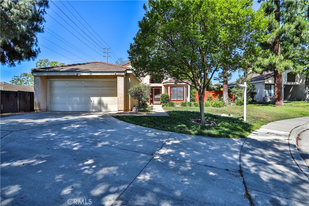 2003 Springcreek Circle Upland, CA 91784 - Photo 3 of 64 a view of a house with a yard