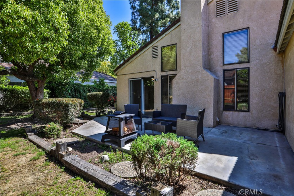 2003 Springcreek Circle Upland, CA 91784 - Photo 44 of 64 a view of a house with backyard sitting area and garden