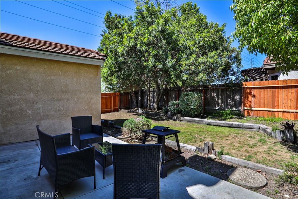 2003 Springcreek Circle Upland, CA 91784 - Photo 51 of 64 a view of backyard of house with seating space